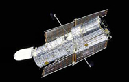 Hubble Space Telescope against a black background (in Space)